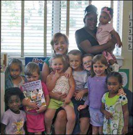 Celebrity reader' visits children at Project Self-Sufficiency