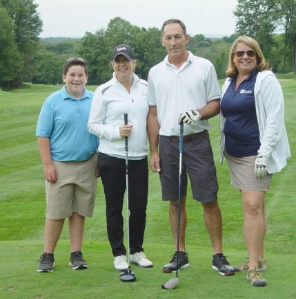 The Winning Team of David Bonser, Stacey Manning, Mattew Carr and Joanne Carr on the 9th tee at Black Bear GC