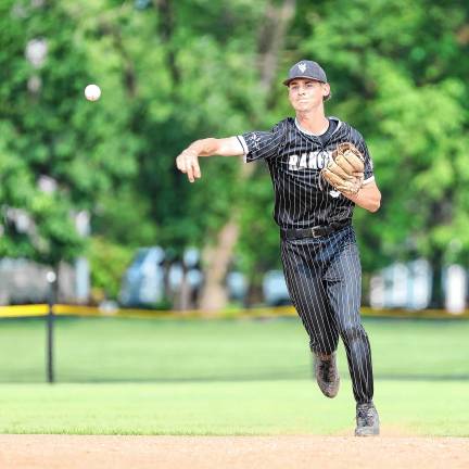 Shortstop Tyler Haberstroh makes a throw to first to get the Pequannock runner in the bottom of the second inning.