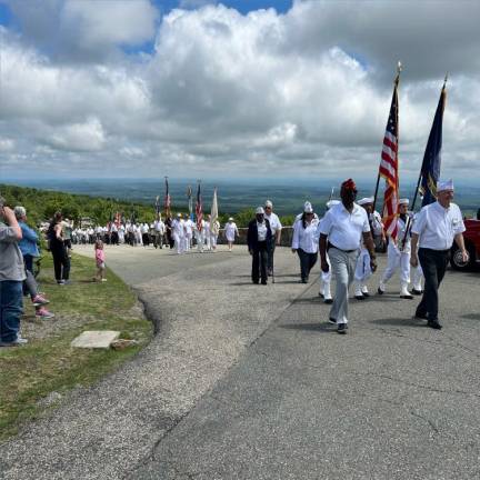 Members of the American Legion march to the New Jersey Veterans’ Memorial on Sunday, June 25.