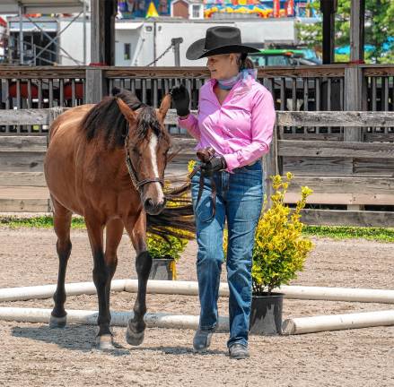 <b>Sandra Witten with Daisy on Saturday, Aug. 2. (Photo by Nancy Madacsi)</b>