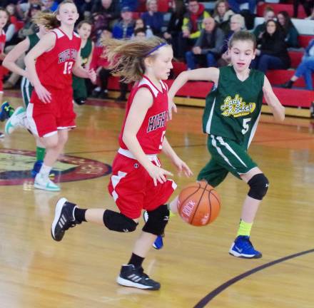 High Point's Kelsey Birchenough dribbles the ball as Rockaway's Kaylee Amachucci keeps pace.
