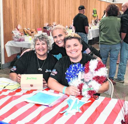 Joey Luchetti's daughters and his wife, Nancy Luchetti Metlter poses with Heather and Caitlin.