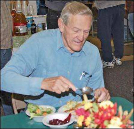 William O'Neill digs into his meal.