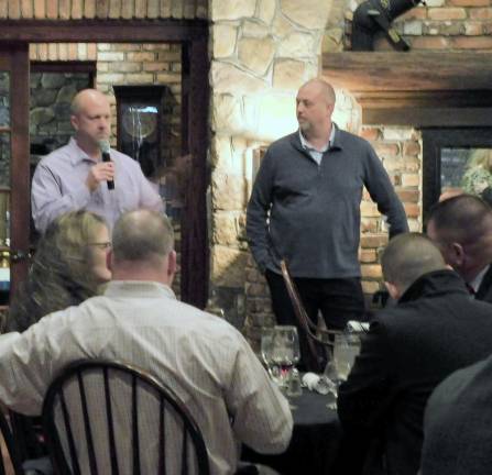 Andover Township Police Chief Eric Danielson, left, treasurer of the Sussex County Association of Chiefs of Police, speaks at the organization’s 50th anniversary celebration dinner Thursday, Dec 8 at the Mohawk House in Sparta. At right is the group’s president, Vernon Township Police Chief Daniel Young.