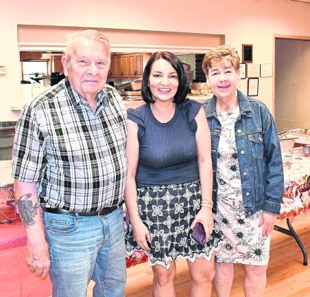Jim Kays of Ogdensburg poses with Michelle Babcock and Martha Stoll, both of Franklin.