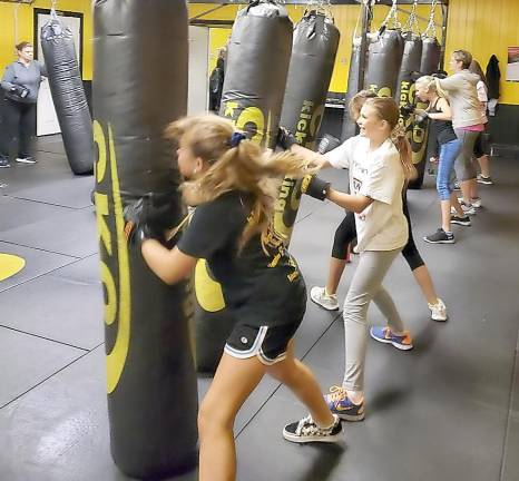 Students practice punching.