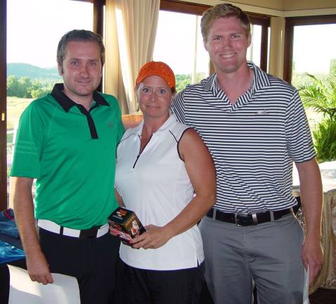 Dona Wallerius receives one of her 3 awards from General Manager Mark Melillo assisted by Kevin Wagoner