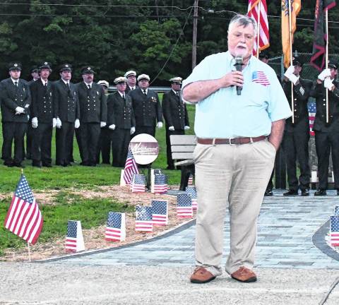 Phil Crabb, former chief of the Franklin Fire Dept., gives a speech.