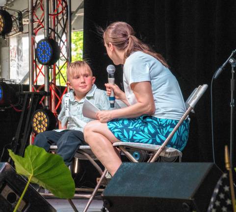 <b>Little Mister Fredon Michael Power is interviewed during the Little Royalty presentation Tuesday, Aug. 5. (Photo by Nancy Madacsi)</b>