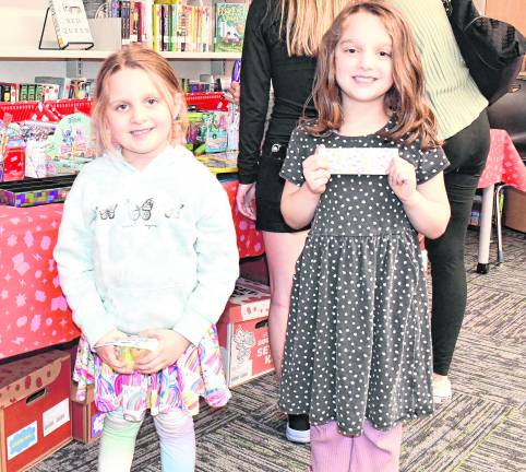 Ruby and Bianca Harvey show off their picks.