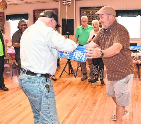 Mike Krupa of Franklin, left, accepts his honor as Senior of the Year.