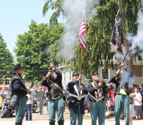 The 15th New York Volunteer Cavalry Company L salute.