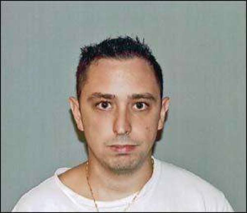 NJ State Police arrest man for theft of domain name