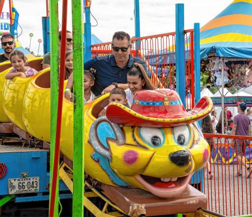 <b>Fair-goers take a ride Saturday, Aug. 2. (Photo by Nancy Madacsi)</b>