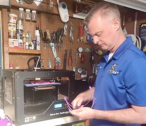 Kittatinny Regional High School teacher Doug Carnegie makes parts for face shields.
