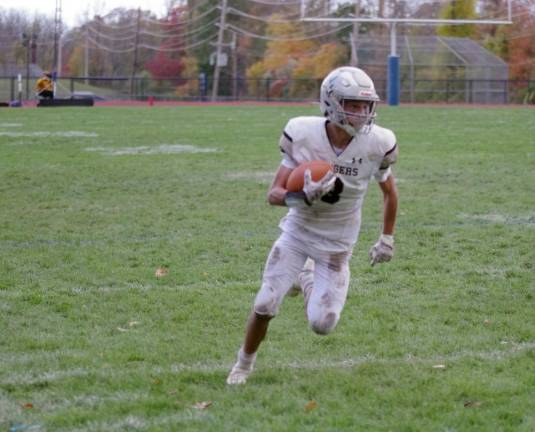 Wallkill Valley wide receiver Anthony Sgroi on the run.