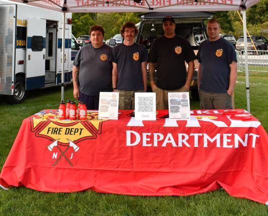 Michael Luterzo, Danny Engelhardt, Corey Houghtaling, Tim Gould of the Franklin Fire Dept. pose for a photo.