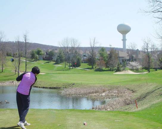 Buffy Whiting tees off on the 10th par 4 hole in the 1st MAT Crystal Cup Tournament.