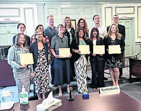 <b>From left, front, Suzanne Bellofatto, Caryn Mandel, Blair Pack, Katherine Perez, Maura Smith, Mary de Poortere; back, Amineh Al-Aydi, Ruchi Naik, Mark Vineis, Ann Johnson, Genna Preson, Eric Hess, Kenneth Gaby-Biegel. </b>