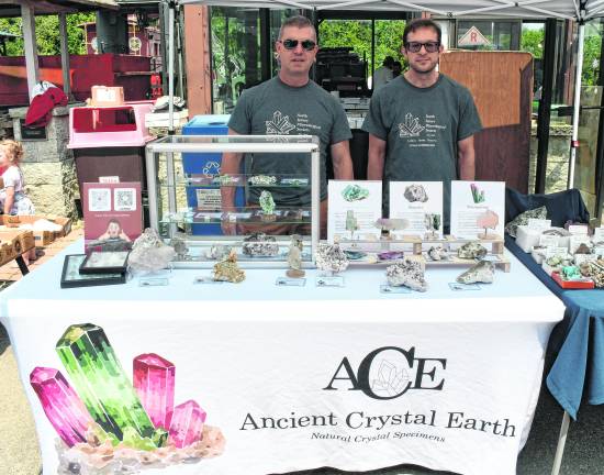 Anthomy Tomaselli of Ancient Crystal Earth and Deavid Lerman of David's Minerals pose for a photo.