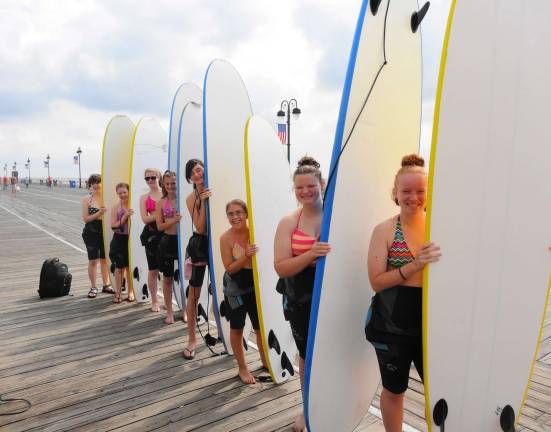 Franklin Cadette Troop 897 recently took its annual trip to Cape May/Wildwood for the Beachjam event held by Morey's Piers. The scouts and parents enjoyed surfing lessons, a dolphin-watching trip, Sunset Beach and the Boardwalk and rides. To join Girl Scouts, please call Dawn Inglis on 201-317-7823.