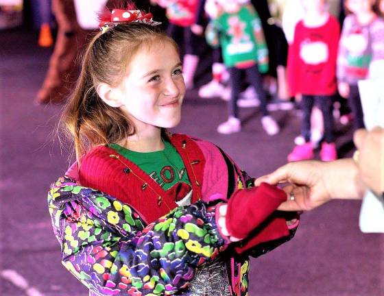 Brooke Cordaro flashes a smile at Simply Dance's Holiday Showcase earlier this December.