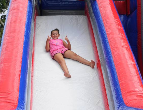 A girl approves of the slide