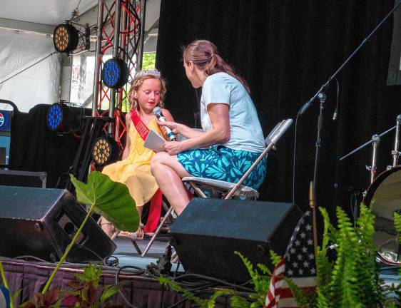 <b>Little Miss Hamburg Riley Parrish is interviewed during the Little Royalty presentation Tuesday, Aug. 5. (Photo by Nancy Madacsi)</b>