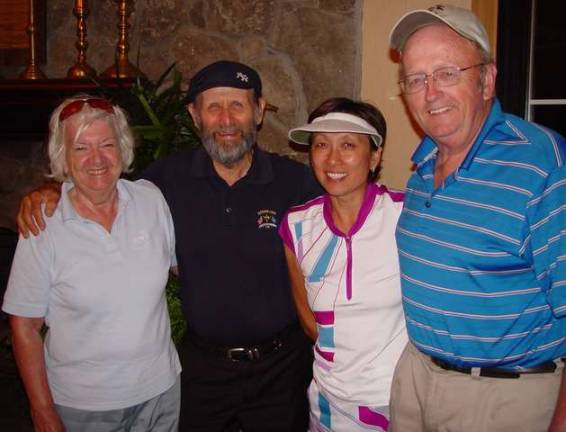 The &#x201c;Birthday Boy&#x201d; J.B. Robertson (in the black hat) celebrates his 80th birthday at 9 &amp; Dine with wife and friends.