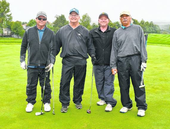 Alan Ardenault of Oak Ridge, Roy Ryan of West Milford, John Burns of Jefferson and Peter Granata of Oak Ridge pose for a photo.