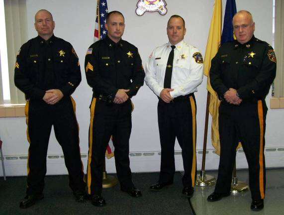 Pictured, from left, Cpl. Stephen Murphy, Sgt. Eric Groeger, Sheriff Michael F. Strada, and Lt. Allan OþÄôGorman.