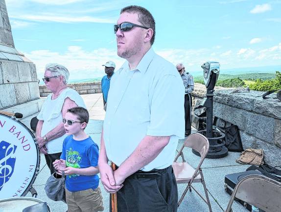 From left, Debbie Lockwood of Hardyston, her grandson, Samuel Ernst, 7; and her son-in-law Robert Ernst at the Franklin Band's performance for the American Legion.