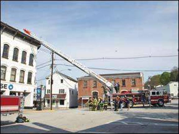 Firefighters practice in downtown setting