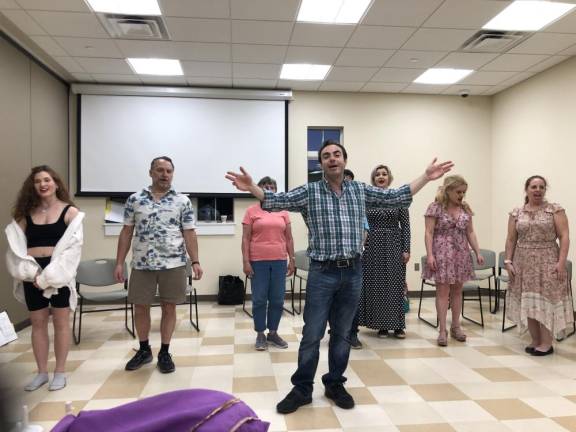 The cast of ‘The Jackie Mason Musical’ rehearses at the West Milford Township Library.