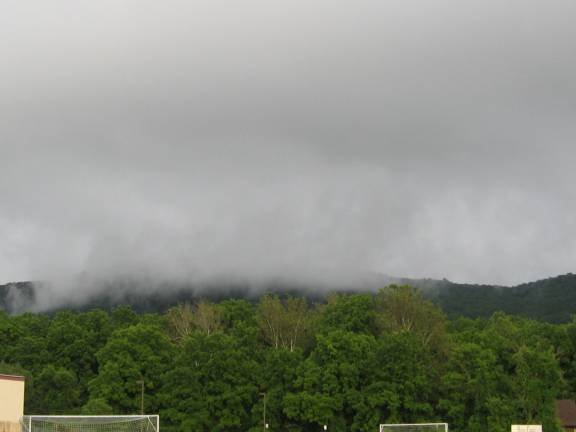 PHOTO BY JANET REDYKEFog settles on the mountains in Vernon after heavy rains.