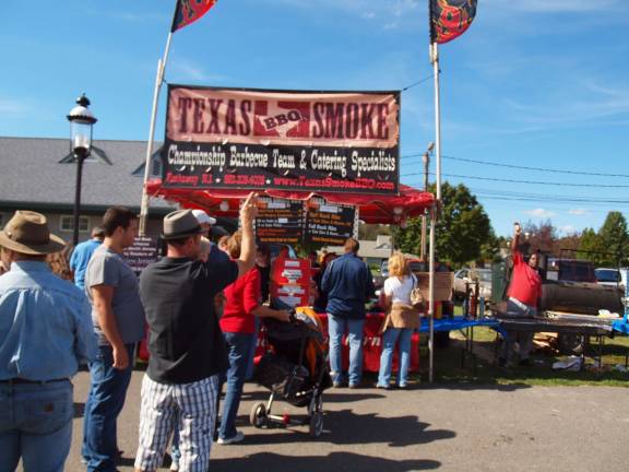 People wait in line at Texas Smoke BBQ based in Jefferson. Texas Smoke BBQ won the 2012 Grand Champion of Grilling category.