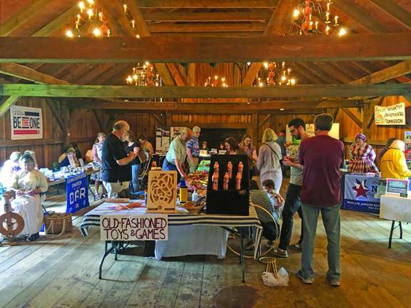 Inside the Mule Barn, vendors and historical groups sold toys, books, wool, honey and other items.