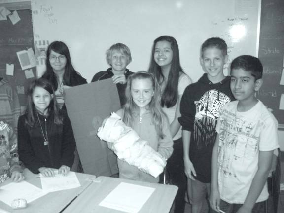 Pictured from left: Sarah Colpaert, Rebekah Russo, William Muzyl, Emma Cahill, Ashley Matzko, David Bicsak and Harshil Bhavsar.