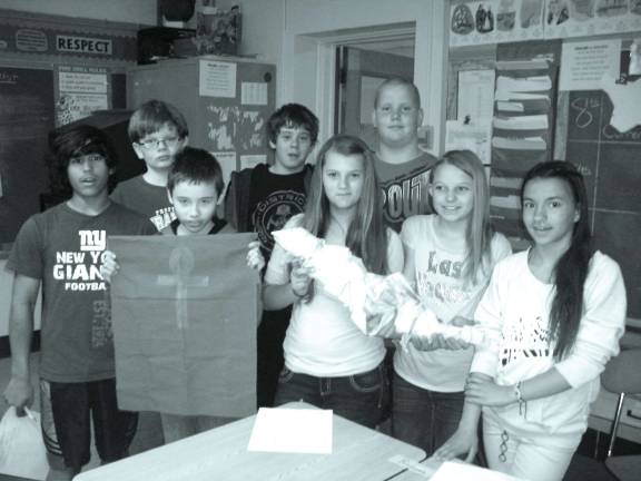 Pictured from left: Michael Torres, Joe Clohessey, Derek Guldan, Julian Martin, Kayleigh Houghtaling, Zane Crum, Alyssa Vanderploeg and Danielle VanTassel.