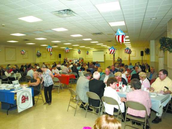 Photos by John Church The crowd in the Fire House Hall Saturday night for the Ogdensburg Centennial Celebration dinner.