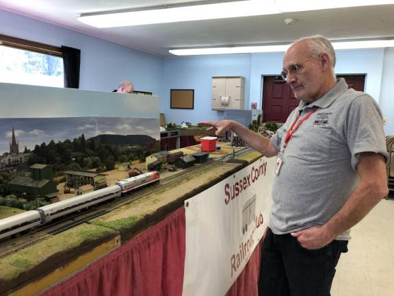 Sussex County Railroad Club member Dave Rutan explains the model train display at Prince of Peace Lutheran Church in Hardyston. (Photo by Kathy Shwiff)