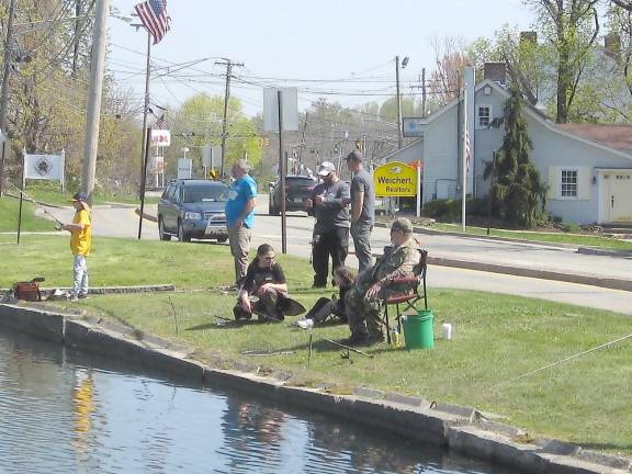Anglers enjoy the day at Fireman’s Pond (Photo by Janet Redyke)