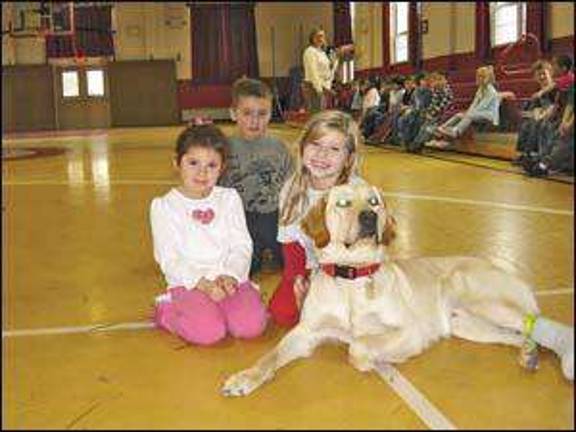 Seeing-eye dog visits school