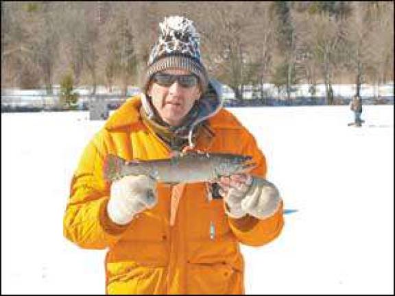 Hardy ice fishing friends catch few