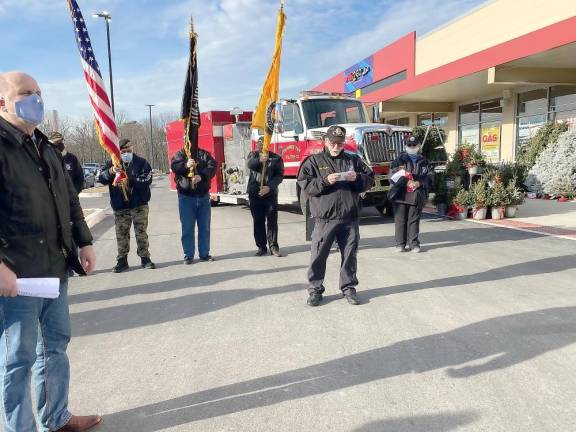 Dennis Curtin (left) Director of Public Relations, Weis Markets; Vietnam Veterans of America, Tri-State Chapter 623, Color Guard with President and Chaplain John Kupillas reading the blessing; and the Delaware Township Volunteer Fire Department (in the background). The Dingmans Township Volunteer Fire Department also attended but is not seen in this photo. (Photo by Marilyn Rosenthal)