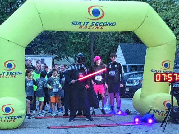 Franklin Recreation Committee member James Affinito, dressed as Darth Vader, prepares to start the May the Fourth Be With You 5K on Saturday, May 4. (Photos by Kathy Shwiff)
