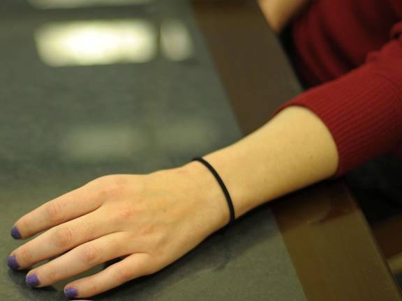 A recovering heroin addict, alias: &quot;Tess,&quot; shows her hand. Tess started using the drug in her thirties. She entered rehab after two years of use.