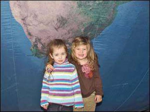 What's big and round and blue all over?