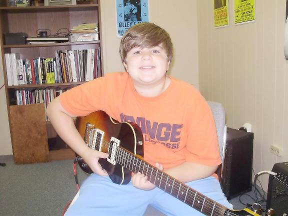 Sparta father and son team awarded music scholarship